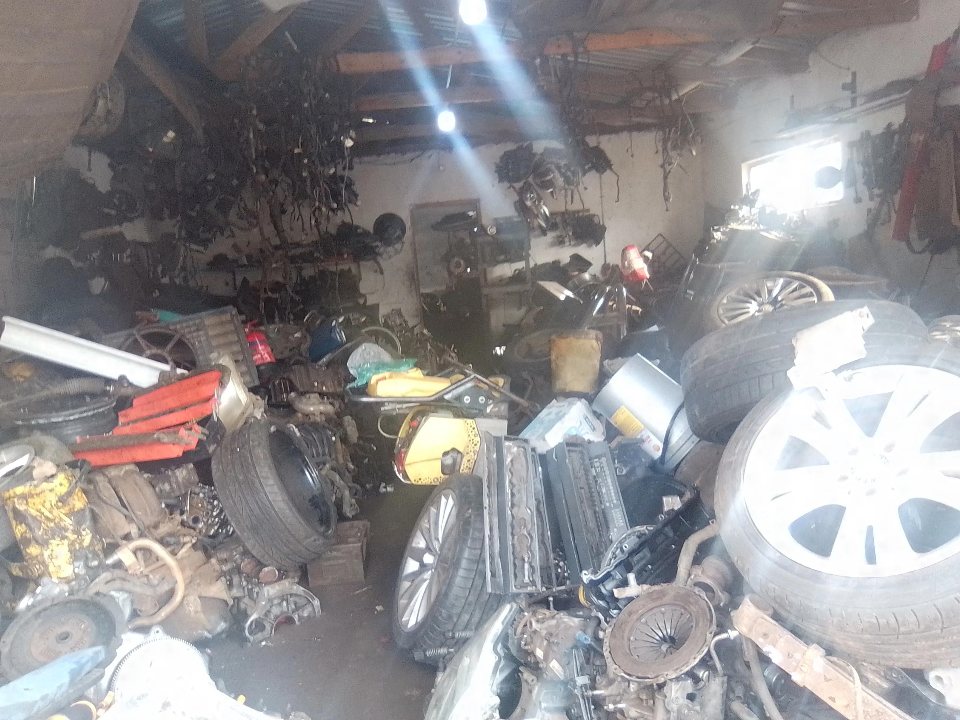 Maqimba motor spares yard — shelves of used car parts